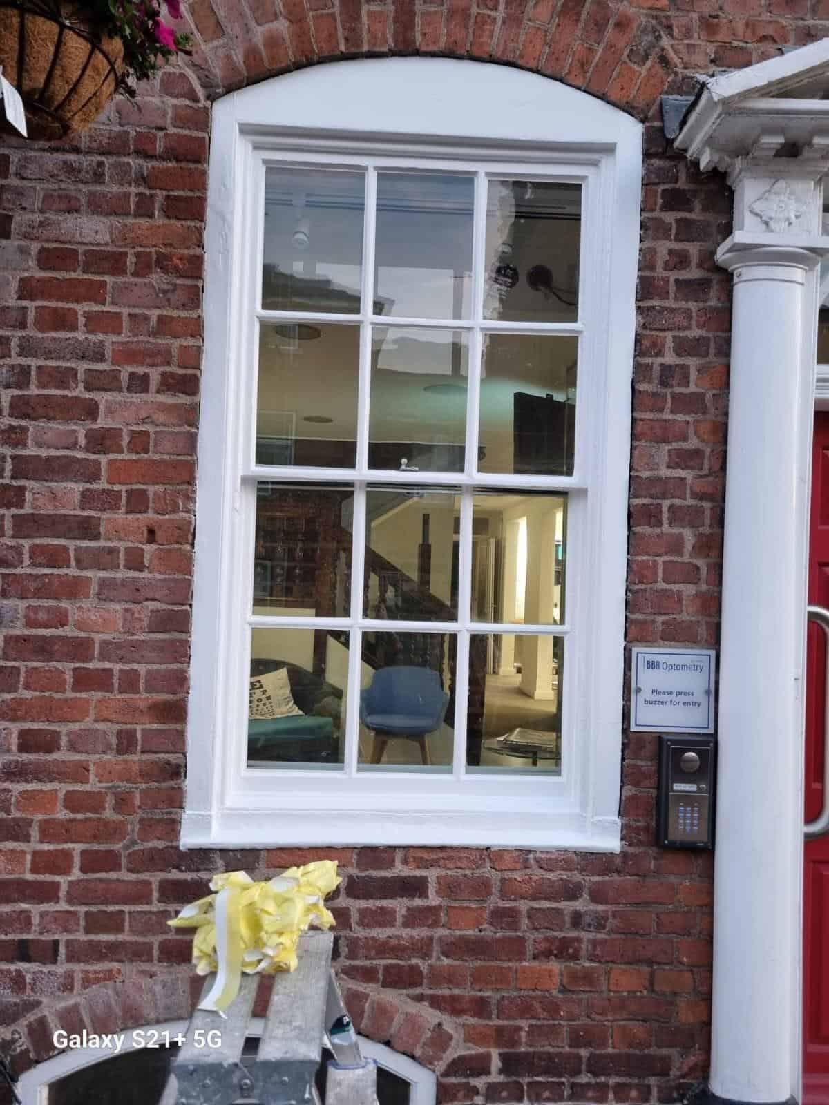 Arched sash window after repainting