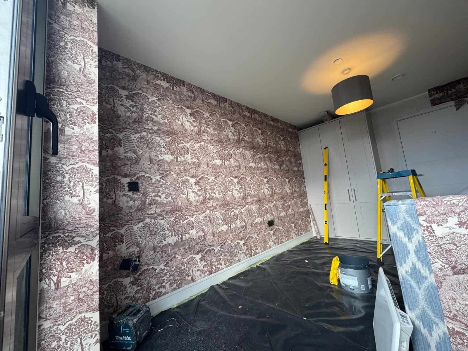 Stone-effect wallpaper feature wall