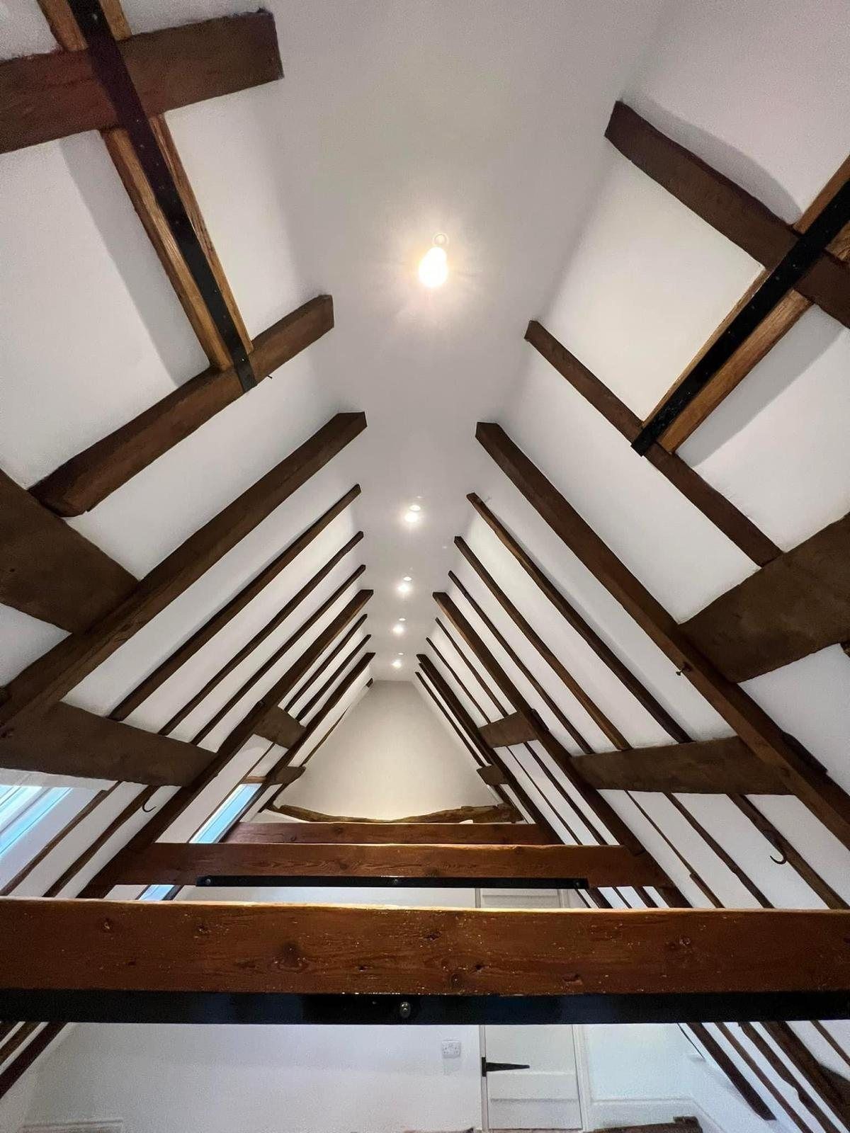 Vaulted ceiling with exposed timber beams