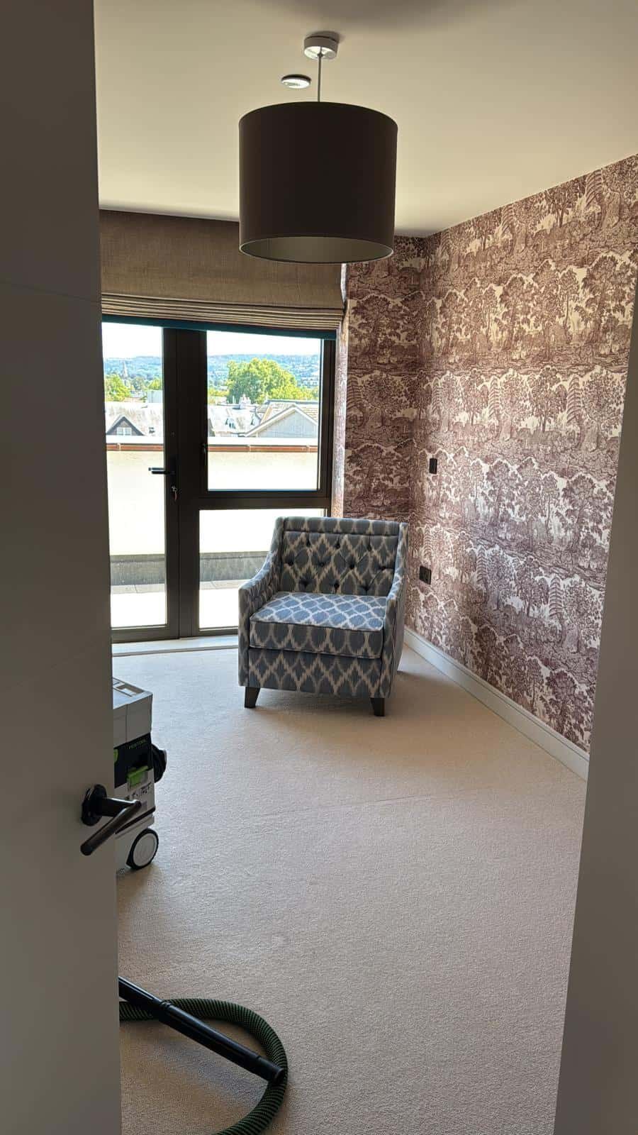 Bedroom with stone-effect wallpaper