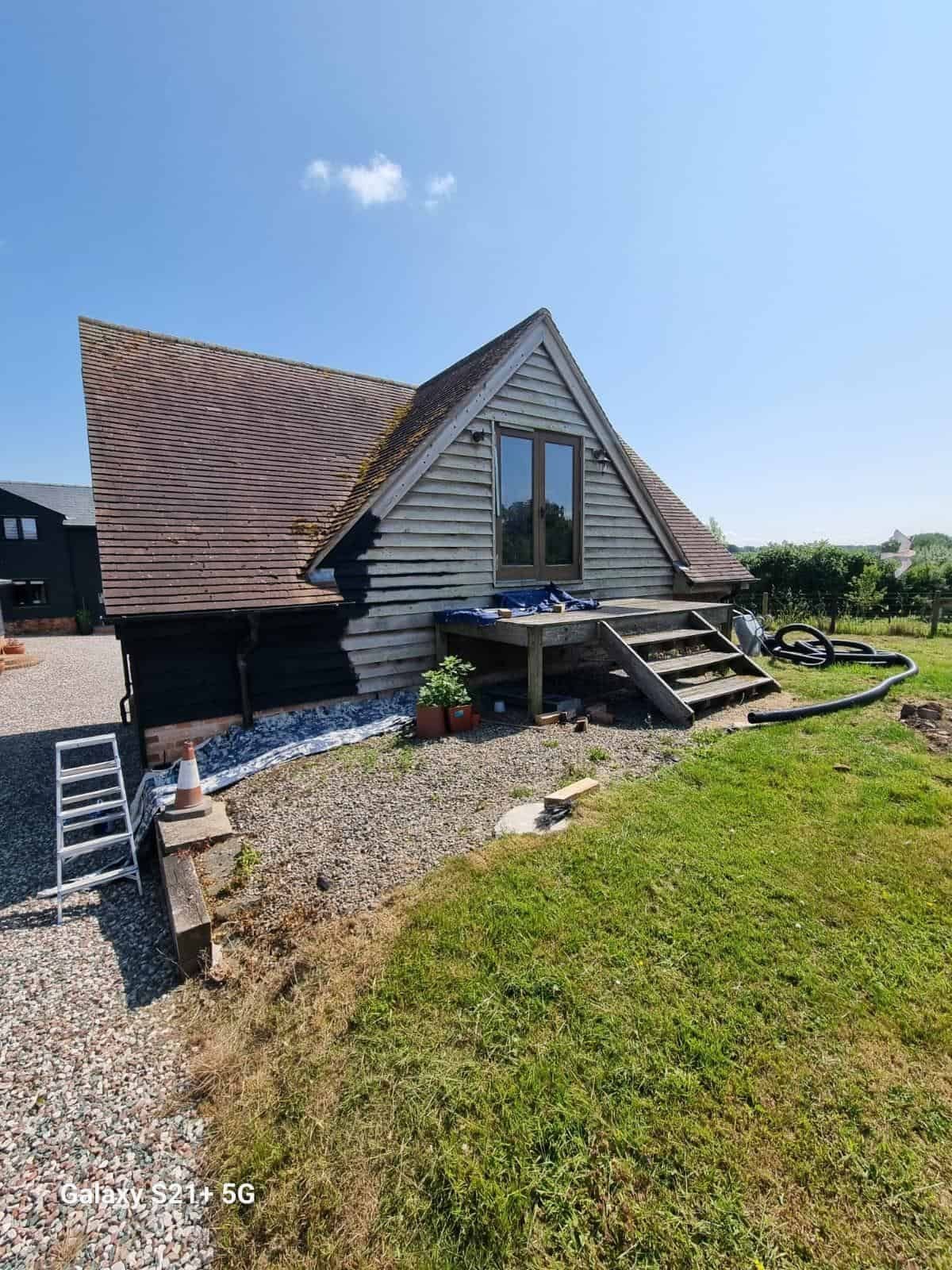 Outbuilding with steps and decking