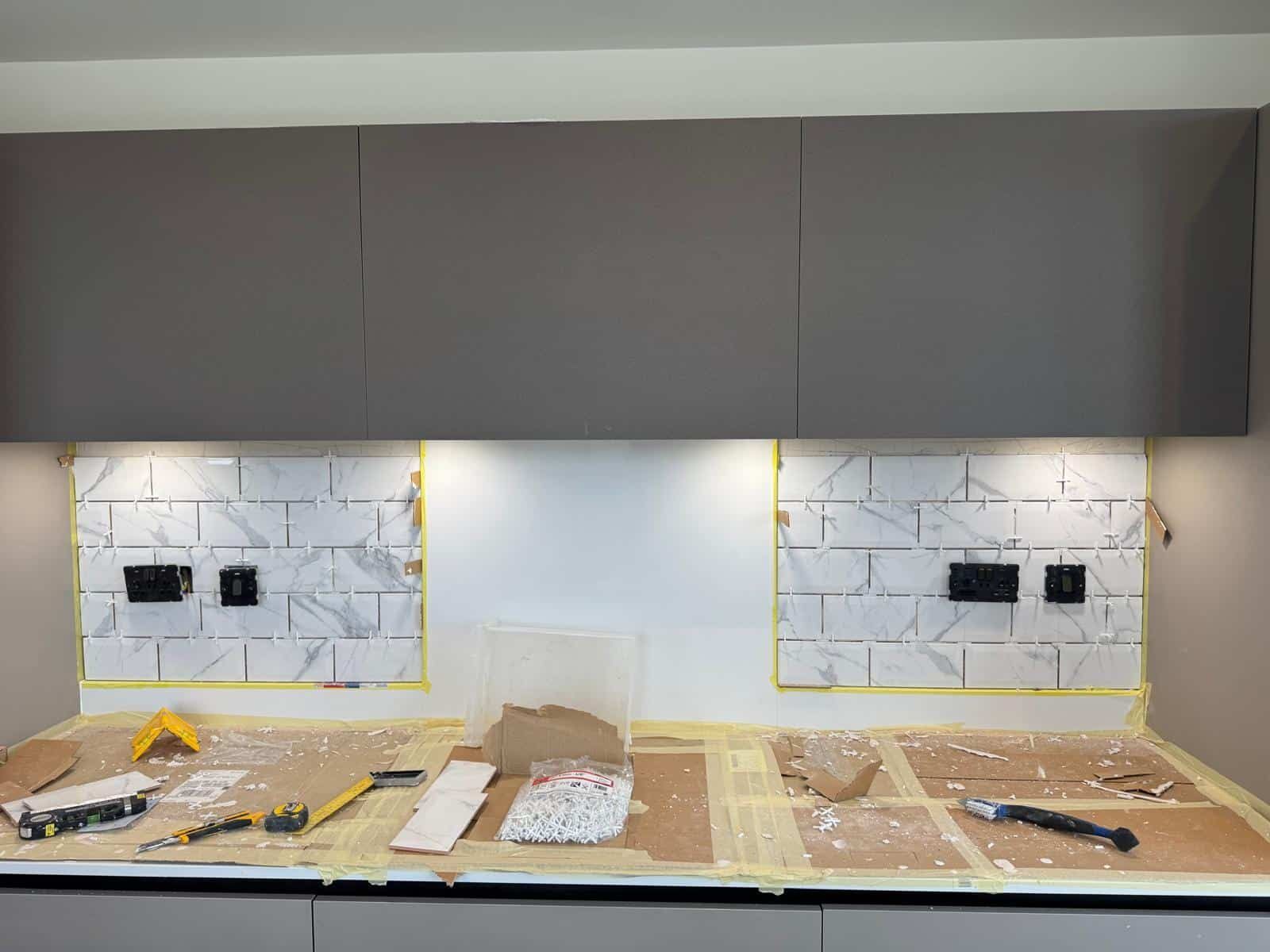 Kitchen splashback tiling in progress